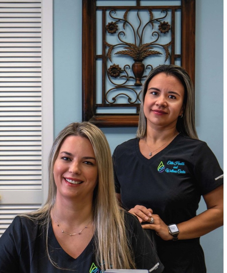 The Elite Health and Wellness Center team at the front desk